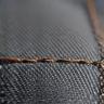 Close-up of a high-quality stitch on fabric.